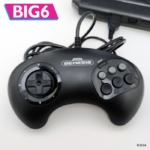Black Sega Genesis controller with a wired plug, featuring a directional pad on the left and a cluster of buttons on the right; BIG6 logo in the top-left corner.