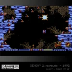BITMAPBROTHERS_COLLECTION1_1500x15004_cbedb719-f4bb-422b-bec7-23c8a799cea1 - Video Game Depot Screenshot from Xenon 2: Megablast showing a player's shot exploding in a dark cavern framed by blue rock walls and brown coral.