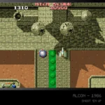 Blaze_EvercadeTOAPLANAlconRGB - Video Game Depot Pixel art arcade shooter: player ship near a green pillar in a temple corridor; score 1310, 1986 Alcon.