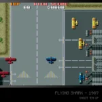 Blaze_EvercadeTOAPLANFlyingSharkRGB - Video Game Depot Blue fighter plane flies along a gray airstrip in a retro arcade shooter, with yellow enemy planes on the right and red planes at left; game title Flying Shark – 1987 at bottom.