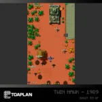 Blaze_RetailAssetsTOAPLAN12 - Video Game Depot Vertical shooter screenshot: desert road with palm trees, a large tank, and multiple enemy planes and helicopters attacking the player.