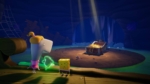 Three whimsical cartoon characters stand on a wooden platform facing a glowing treasure chest on a circular island at nightfall in a cavern.