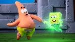 Patrick Star reaches toward a glowing, ghostly SpongeBob in a metal ship interior.