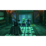LEGO Batman faces three prisoners in a high-tech interrogation room, Joker in green with Batman visible from behind.