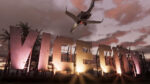 Large illuminated 'WELCOME' sign at dusk with a passenger plane flying overhead.