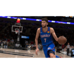 Basketball player in a blue Thunder jersey #7 dribbles down the court during a game with a cheering arena crowd behind him.