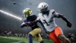 33cbb83f-c8fc-4868-b16e-81da2b78cfa1 - Video Game Depot Two football players sprint for the ball in a rain-soaked stadium, one in a white jersey with orange pants on the right.
