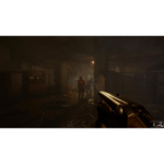 First-person view in a dark, wet corridor, aiming a pistol at two approaching enemies in the distance.