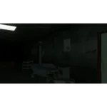 Dim hospital corridor with a blue wheeled stretcher, a medical cart, and posters on the dark wall.
