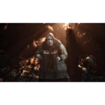 6138_4bkp2L_SL1500___443291783705462 - Video Game Depot Elderly woman in a hooded shawl playing an accordion in a dim, smoky cave-like setting with warm backlight.