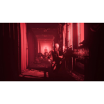 61KD6V_IoRL_SL1500___535951781724394 - Video Game Depot Person in a helmet crawls through a red-lit hallway, others kneeling behind him under dramatic lighting.