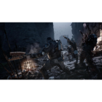71OYxPd1y1L_SL1500___650601783705462 - Video Game Depot Knight in heavy armor lunges with a weapon at enemies in a dark cavern, a lit brazier glowing at his feet.