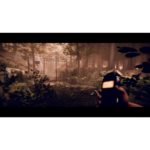 71mCwOGx8YL_SL1500___890581781729002 - Video Game Depot First-person view of a forest path with an ornate wrought-iron gate ahead, hand holding a camera in the foreground.