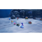 A snowy beach scene with a female character in a blue dress standing among small colorful creatures and crab-like aliens, with rocky cliffs in the background.