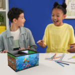 815qII911oL_AC_SL1500___126171785269503 - Video Game Depot Two kids sit at a white table and chat, with a Minecraft-themed storage box in front of them and notebooks nearby.