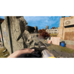 81BFjr5NpML_SL1500___469051776803165 - Video Game Depot First-person view holding a rocket launcher amid ruined urban scenery with rubble and buildings in the distance and blue sky.