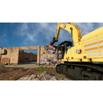 81Qa2YtHttL_SL1500___092041776803160 - Video Game Depot Yellow CAT excavator demolishing a graffiti-covered concrete wall at a construction site; rubble on the ground under a blue sky