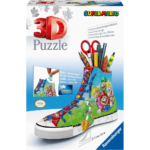 81ojrMA3C_L_AC_SL1500___067361785270348 - Video Game Depot Box for a 3D Puzzle featuring a Mario-themed sneaker filled with colorful pencils and art supplies, Ravensburger brand evident on the cover