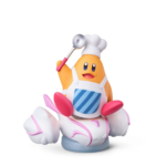 8a4ada3f-06e7-4563-ba55-3248fddbb78b__649171783439912 - Video Game Depot Cartoon orange chef figure wearing a white apron and hat, holding a ladle aloft.