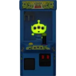 Three-eyed green alien toy inside a blue Toy Story crane game, waving from the display.