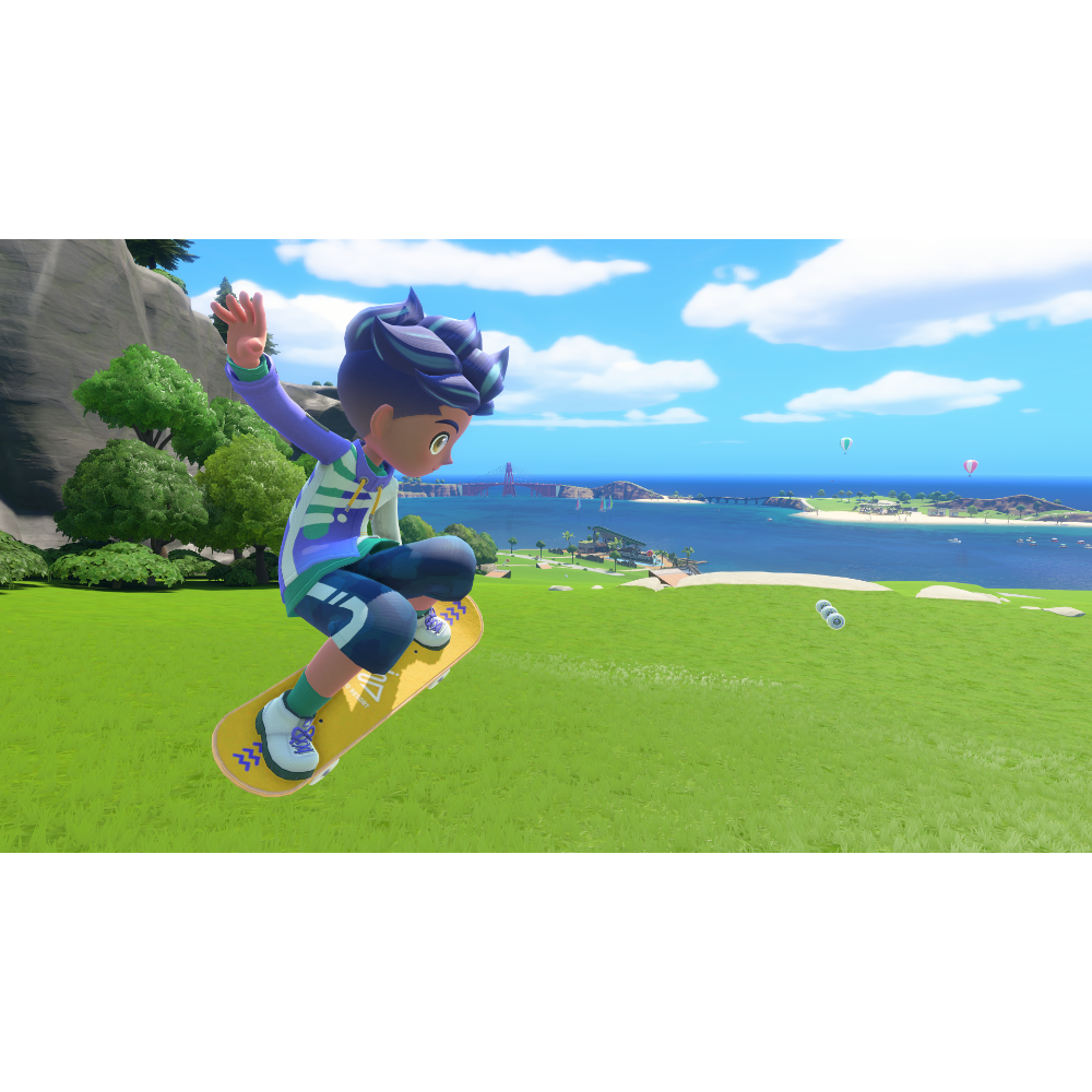 Cartoon child jumping on a yellow skateboard over a grassy hill with a coastal town and bridge in the background.