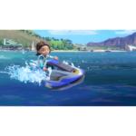 Nintendo_Switch_Sports_Resort_Screen_13__653411781039454 - Video Game Depot Cartoon girl in a blue wetsuit rides a purple jet ski across bright blue water with a beach and green hills in the background.