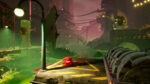 Super_Meat_Boy_3D_PS5-NS2_Screen_06__655641775672396 - Video Game Depot Cartoon red creature with a wide smile stands on yellow markings amid a toxic, neon-green industrial landscape.