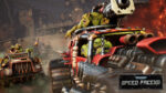 Warhammer_PS5_Screen_09__749231777584826 - Video Game Depot Orc drivers on a brutal red war vehicle with spikes and huge exhausts racing through a smoky industrial battlefield; Speed Freeks logo in the corner.