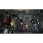 a1022ba8-73ce-40a9-90f9-3e9cd6554077__812101781638979 - Video Game Depot A quartet of dark-armored figures with weapons stand in a rain-soaked medieval street, one holding a shield with runic markings.