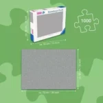 d58072a2-7220-4d1c-8419-f6369a560014__097601785345986 - Video Game Depot Infographic comparing a 1000-piece Ravensburger puzzle box with a gray rug; box ~34 cm by 26 cm; rug ~70 cm by 50 cm.