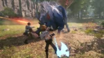 f8b3b7dd-c98d-4934-9b4d-64a3d7b766d2 - Video Game Depot Two players battle a large blue, spiked wolf-like creature in a forest, swinging swords and axes as a glowing beam fires from offscreen.