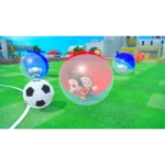 Cartoon monkeys inside translucent colored bubbles around a soccer ball on a bright green field.