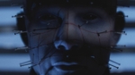 060957f5-8b04-48f5-acea-ba11a95938af - Video Game Depot Close-up of a person's face with numerous needles pinned across the skin under blue lighting, suggesting a medical or experimental setup.