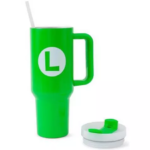 8cea5770-bfec-428b-8e4f-e2e949d30e6b__592581785440087 - Video Game Depot Green reusable travel mug with a white straw and a detached lid on the side.