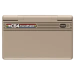 C64Image5 - Video Game Depot Beige handheld game console with 'THE C64 handheld' logo on the front and a power button on the right side, front view