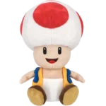 Plush toy of Toad from Mario: white mushroom cap with red spots, beige face, blue vest with yellow straps, seated.