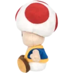 Toad character from Mario franchise, seen in a blue vest and yellow trim, facing left.