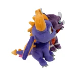 Two purple dragon plush toys with orange spikes, one in front and a smaller one behind, both smiling kindly.