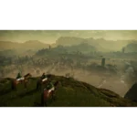 attack-on-titan-3-screen-06__968931785948152 - Video Game Depot Four armored horsemen on a hill overlook a sprawling valley with a ruined town and distant towers.
