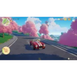 Red convertible drives along a winding road with pink trees and blue sky in a video game setting, center car in view.