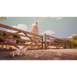 Cat walking along a dirt path beside a wooden fence with a windmill in the background on a sunny farm.