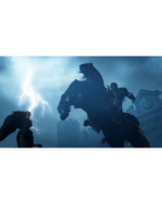 Two enormous monsters clash in a stormy night near ruined stone architecture, lightning flashing in the sky behind them.