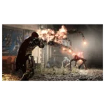 Armored warrior with a red cape fires at grotesque creatures in a ruined city street.