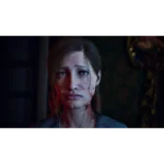 Close-up of a woman with smeared blood on her face and neck, looking distressed in a dimly lit setting.